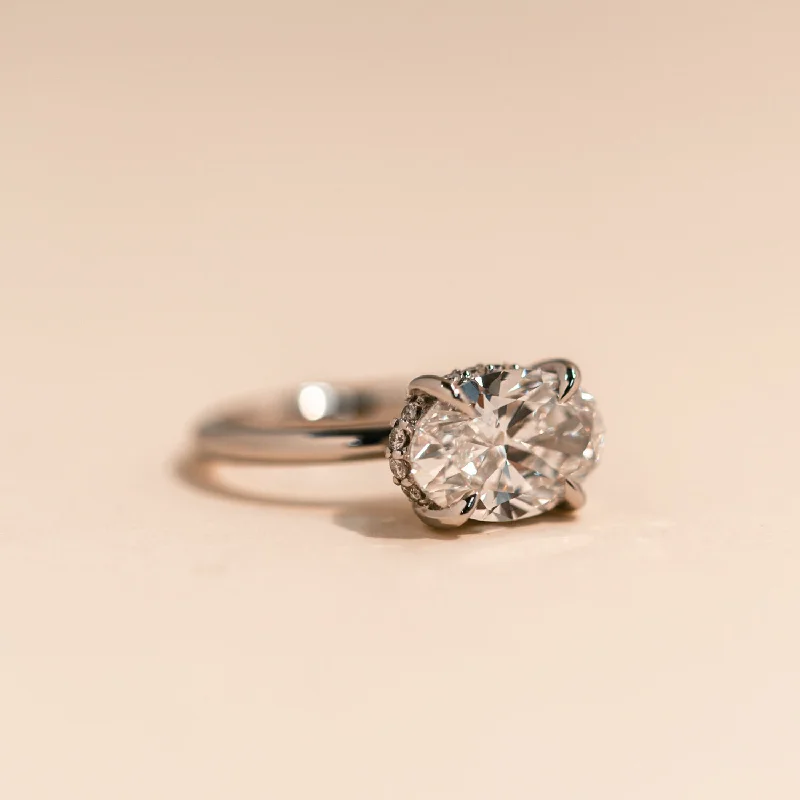 EAST WEST OVAL ENGAGEMENT RING