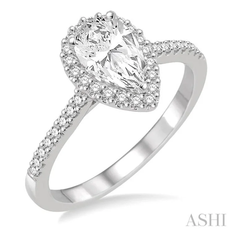 5/8 Ctw Diamond Engagement Ring with 1/3 Ct Pear Shaped Center stone in 14K White Gold